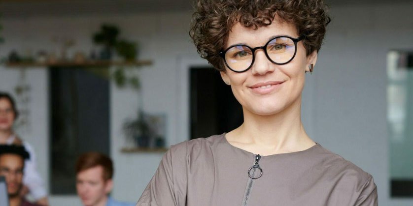 real estate agent standing in an office